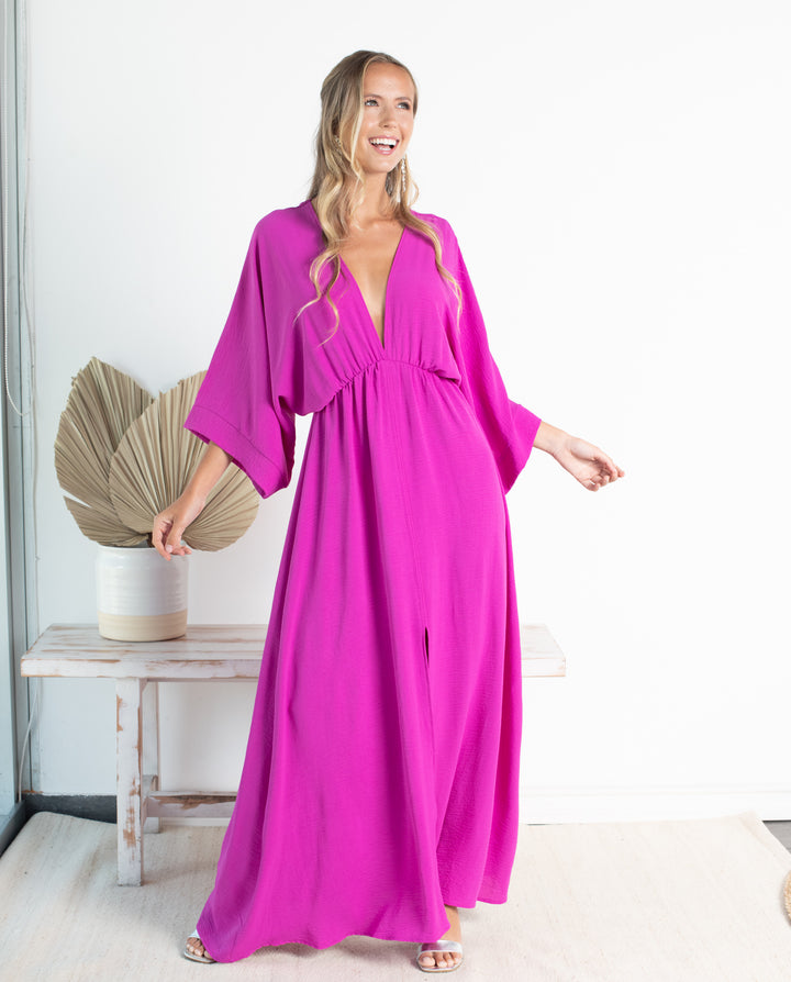 VESTIDO DE FIESTA LARGO POLA FUCSIA